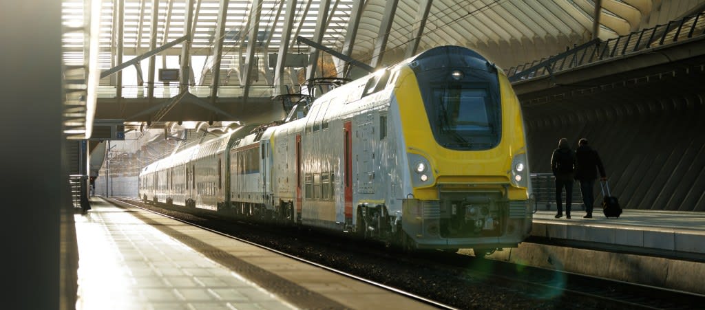 A train is shown in a station.