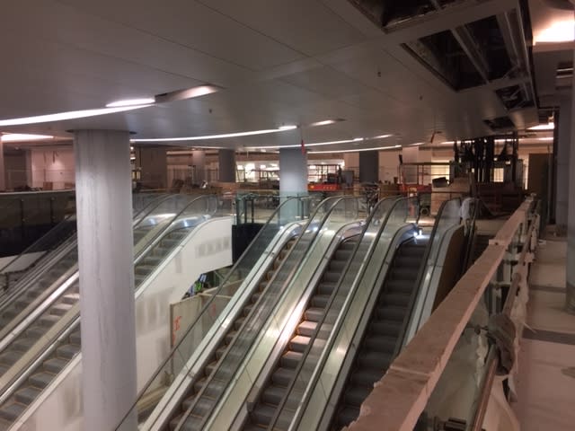 a row of escalators.