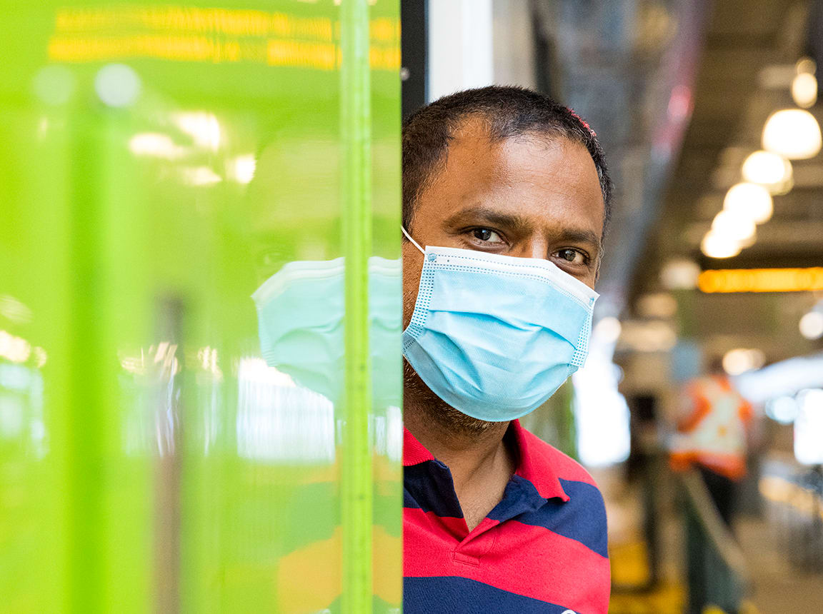 A passanger stands in the door of a train. (Lorne Bridgman photo)