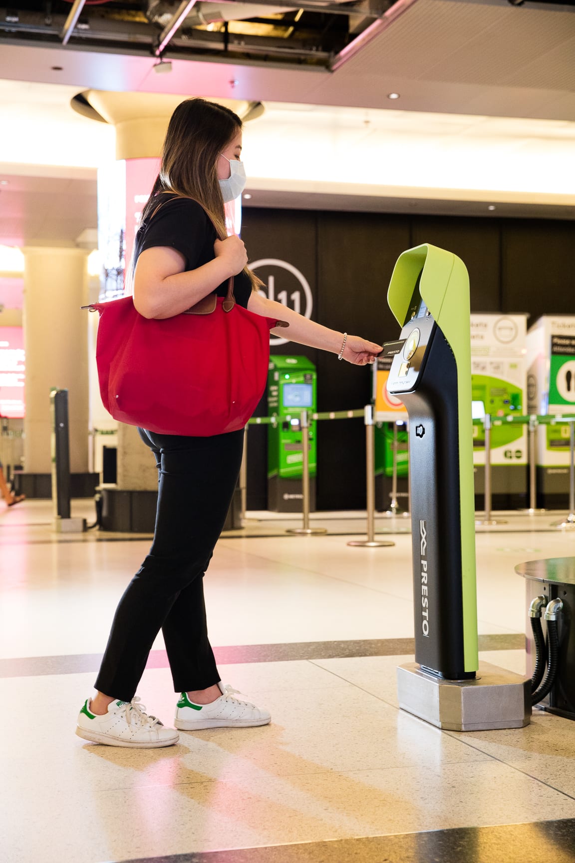 GO customer tapping their PRESTO card at Union Station