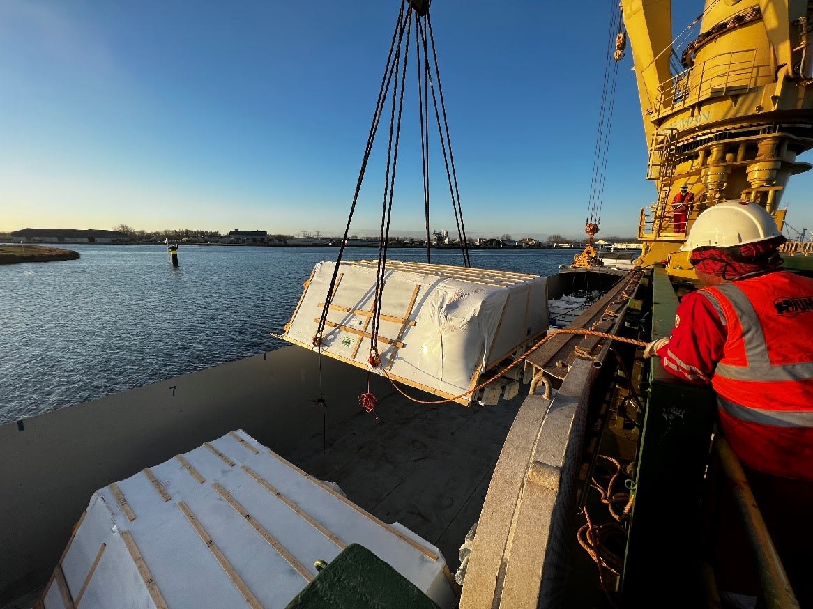 a deck hand watching over cargo.