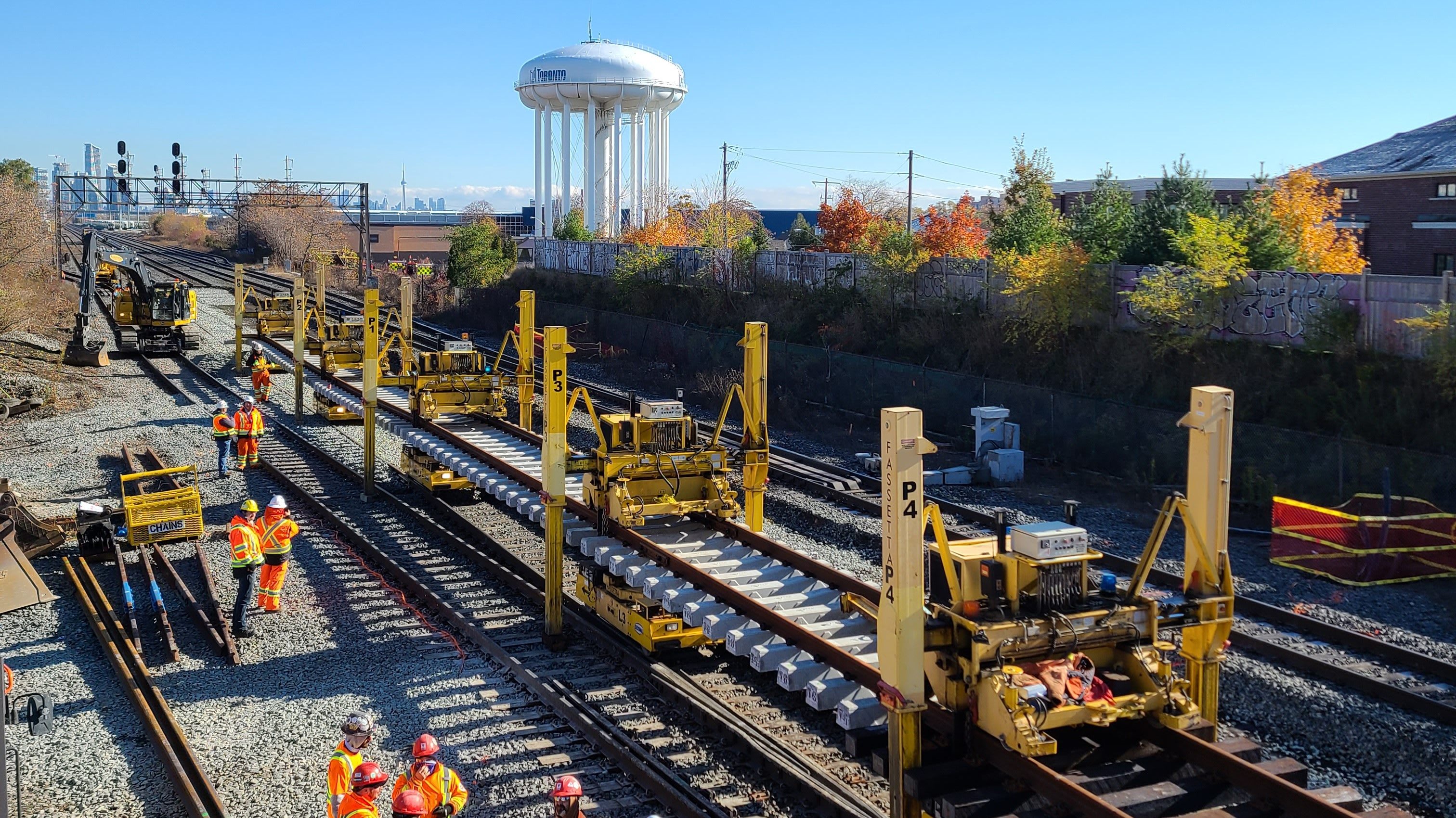 Work crews replacing track and signal infrastructure