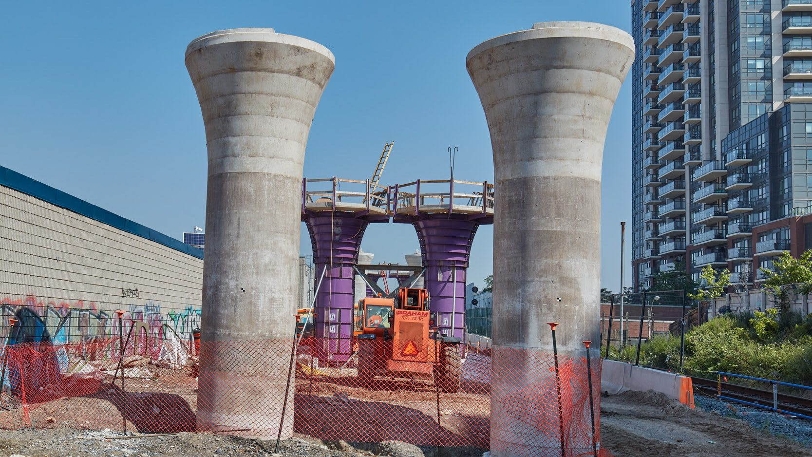 the elevated guideway concrete columns south of Dupont Street