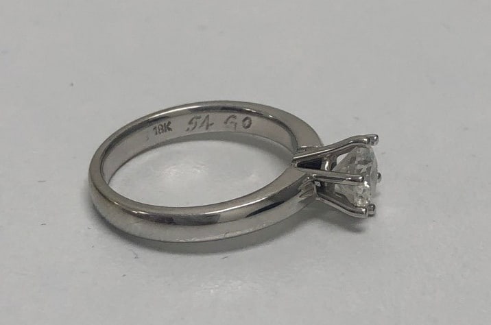 the engraved ring.