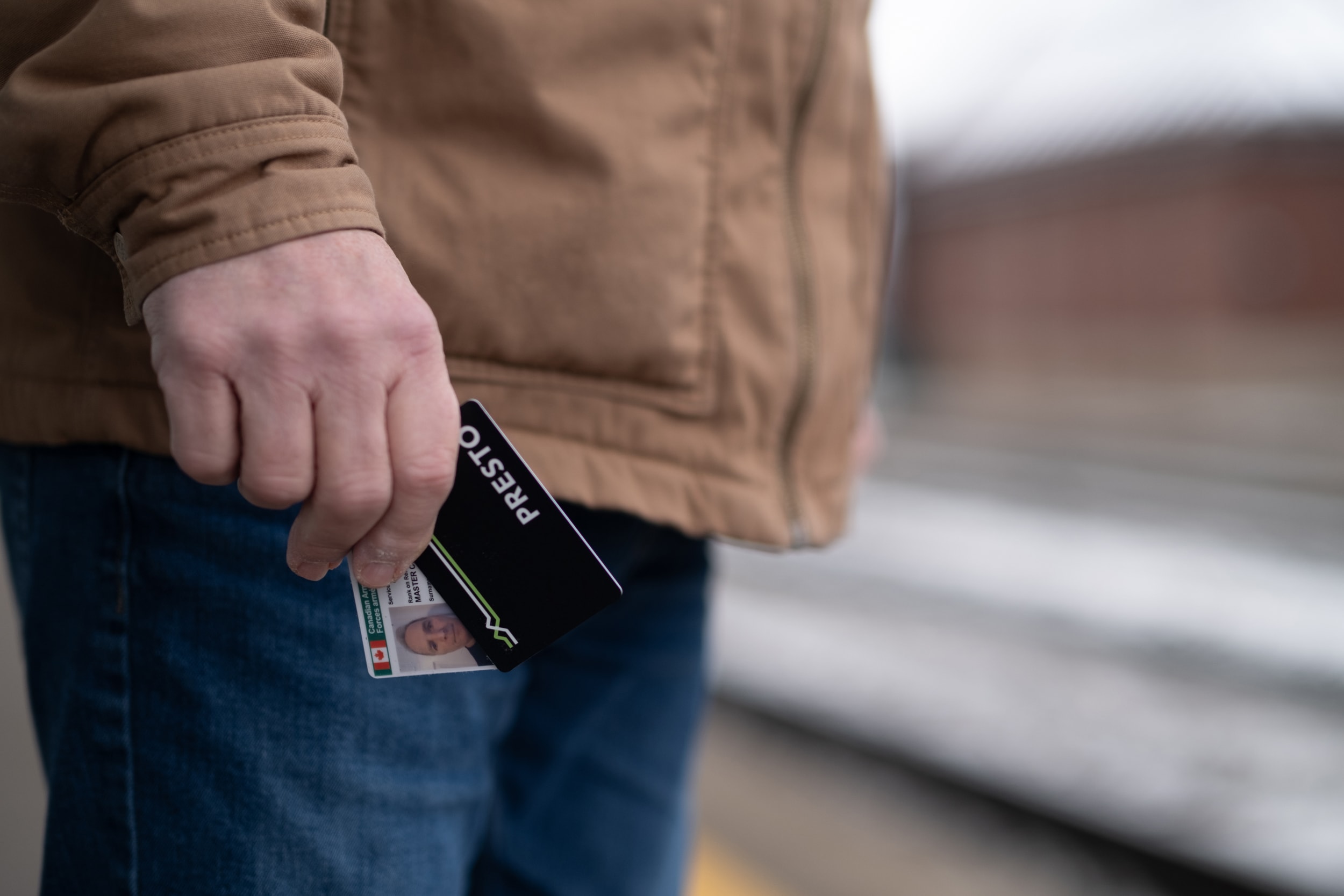 Veterans riding GO Train with PRESTO Card