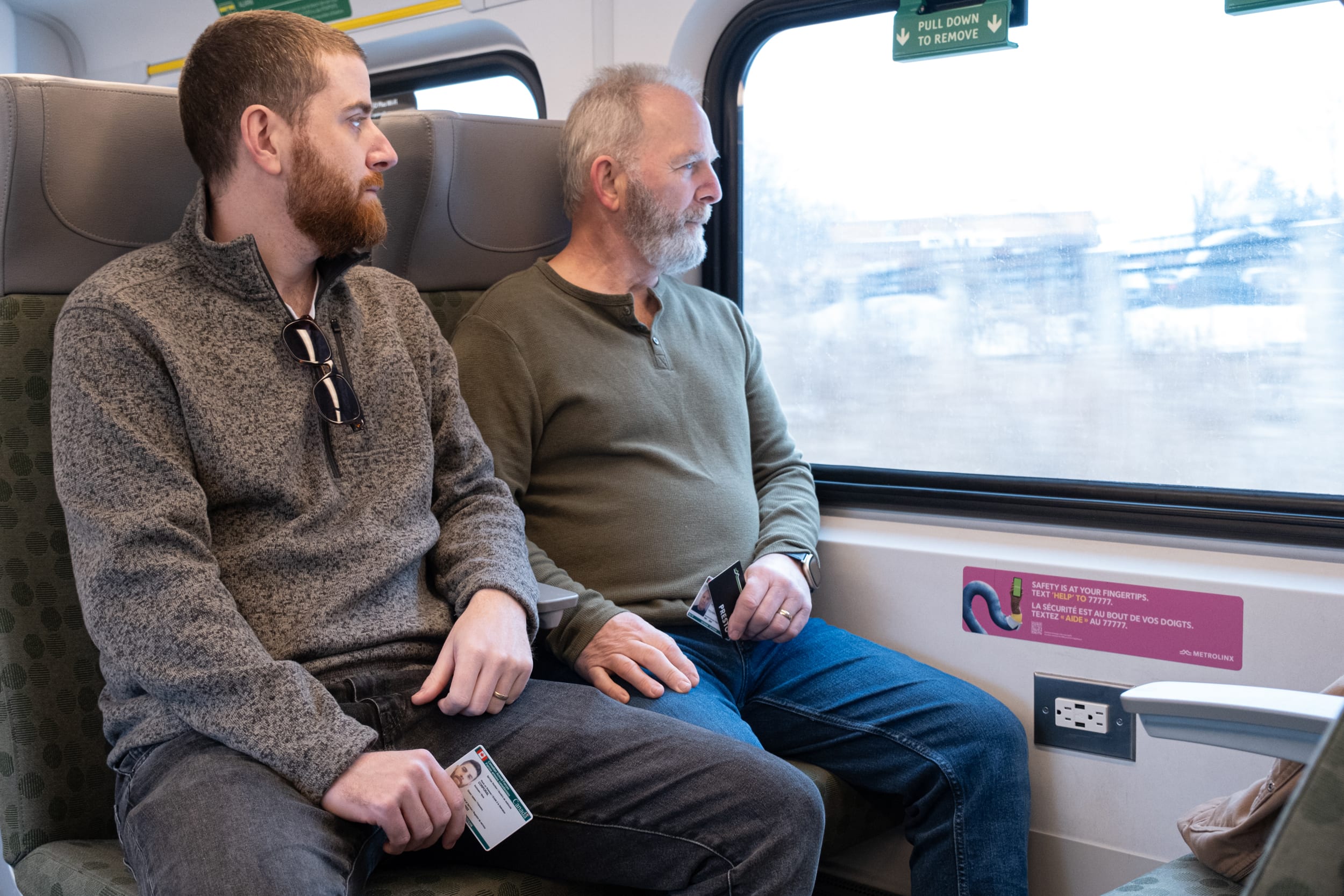 Veterans riding GO Train with PRESTO Card