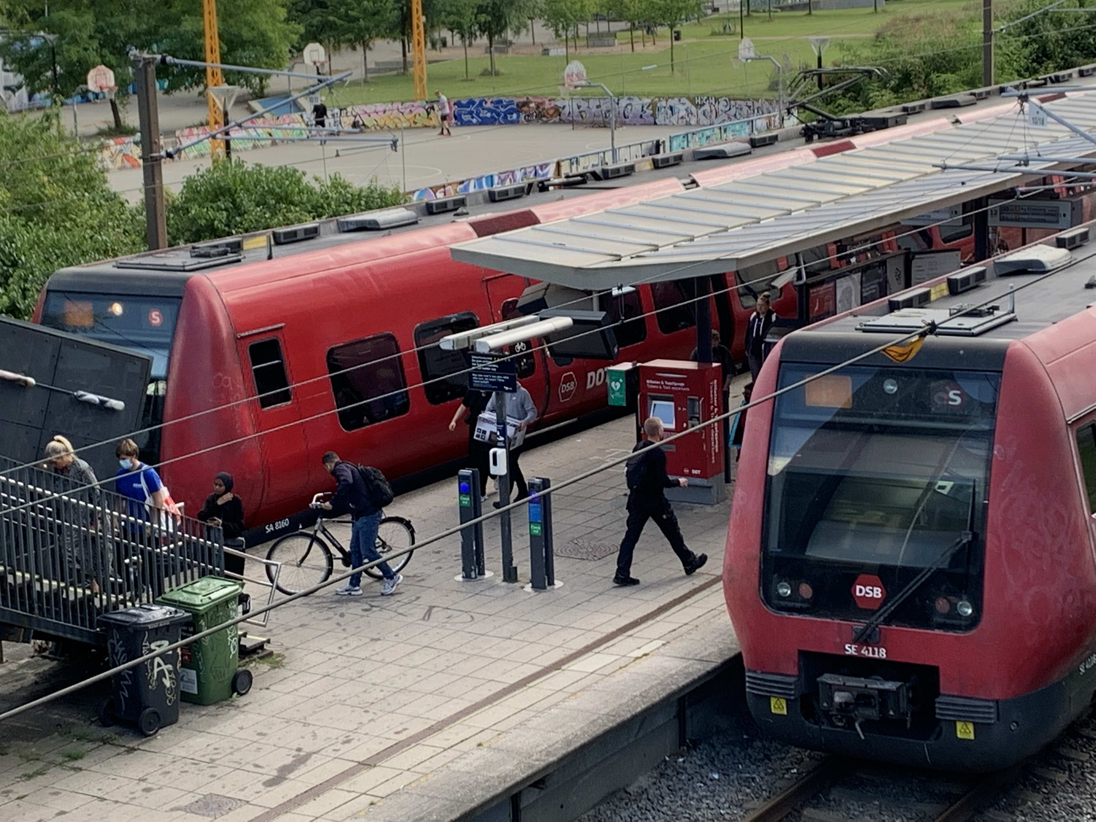 Electric trains are shown in Copenhagen