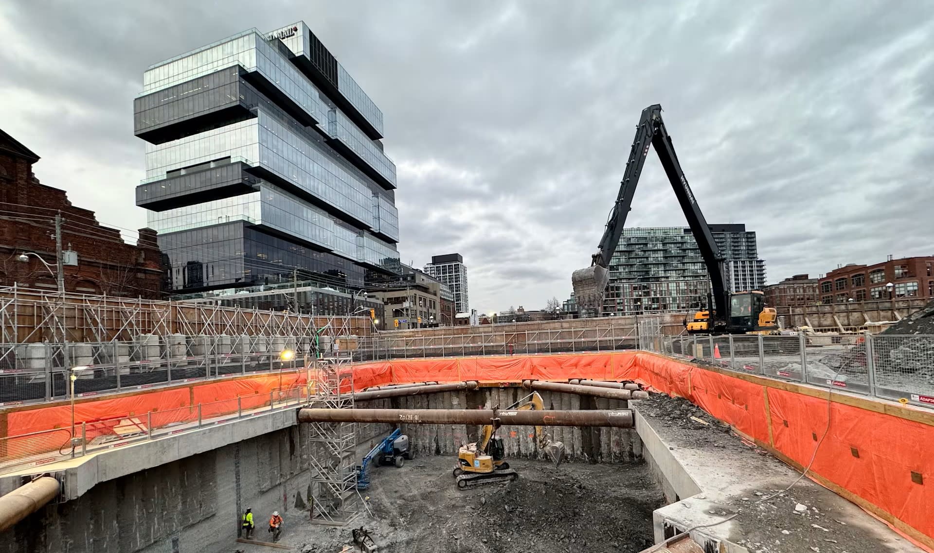 Overlooking an excavation at the future Corktown Ontario Line station.