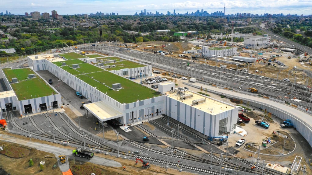 the large building with tracks all around.