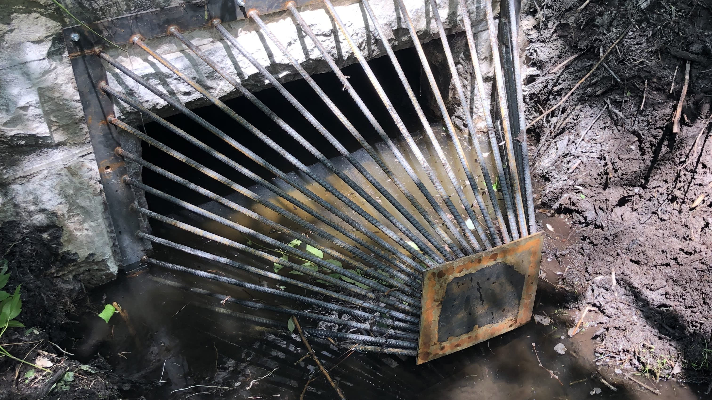 A culvert cage was added to keep the water flowing and prevent floods.