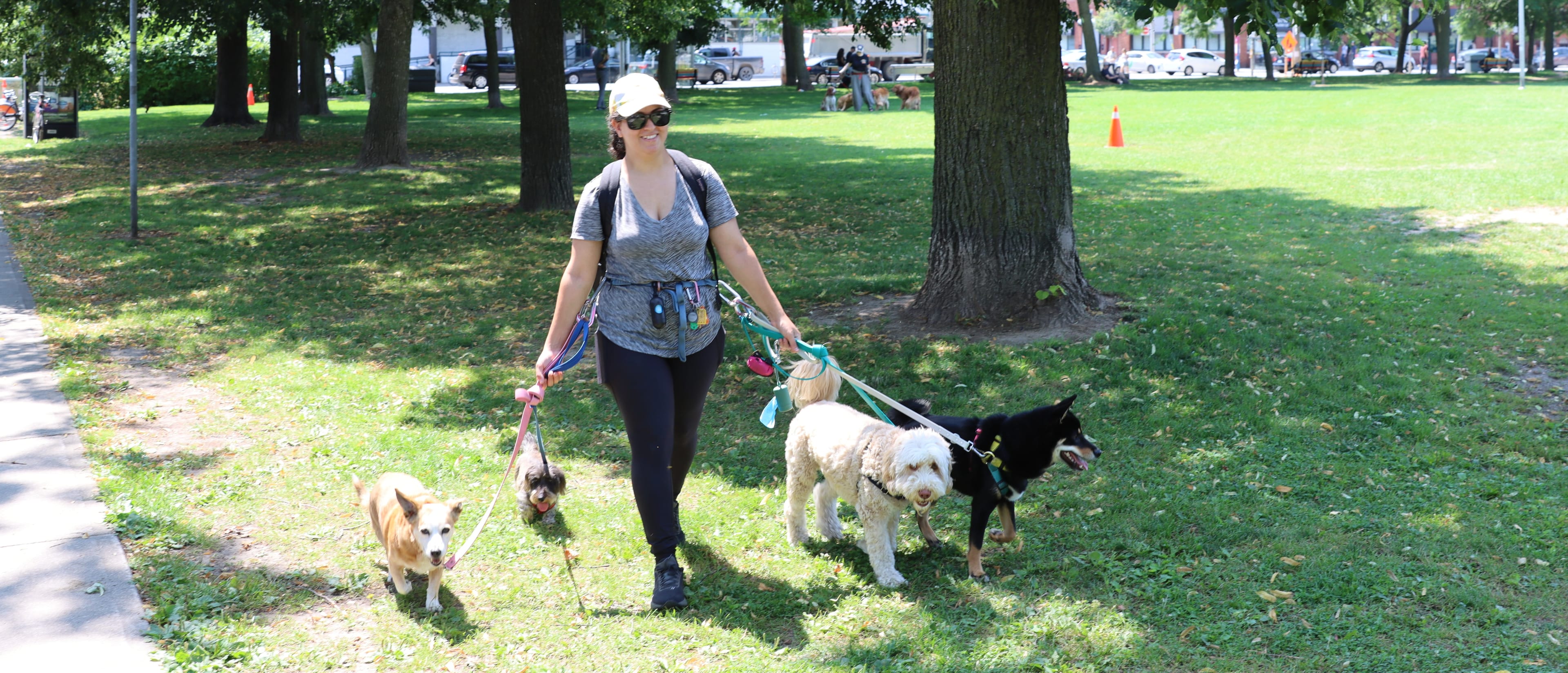Jasmine Norman and dogs in Jimmie Simpson Park
