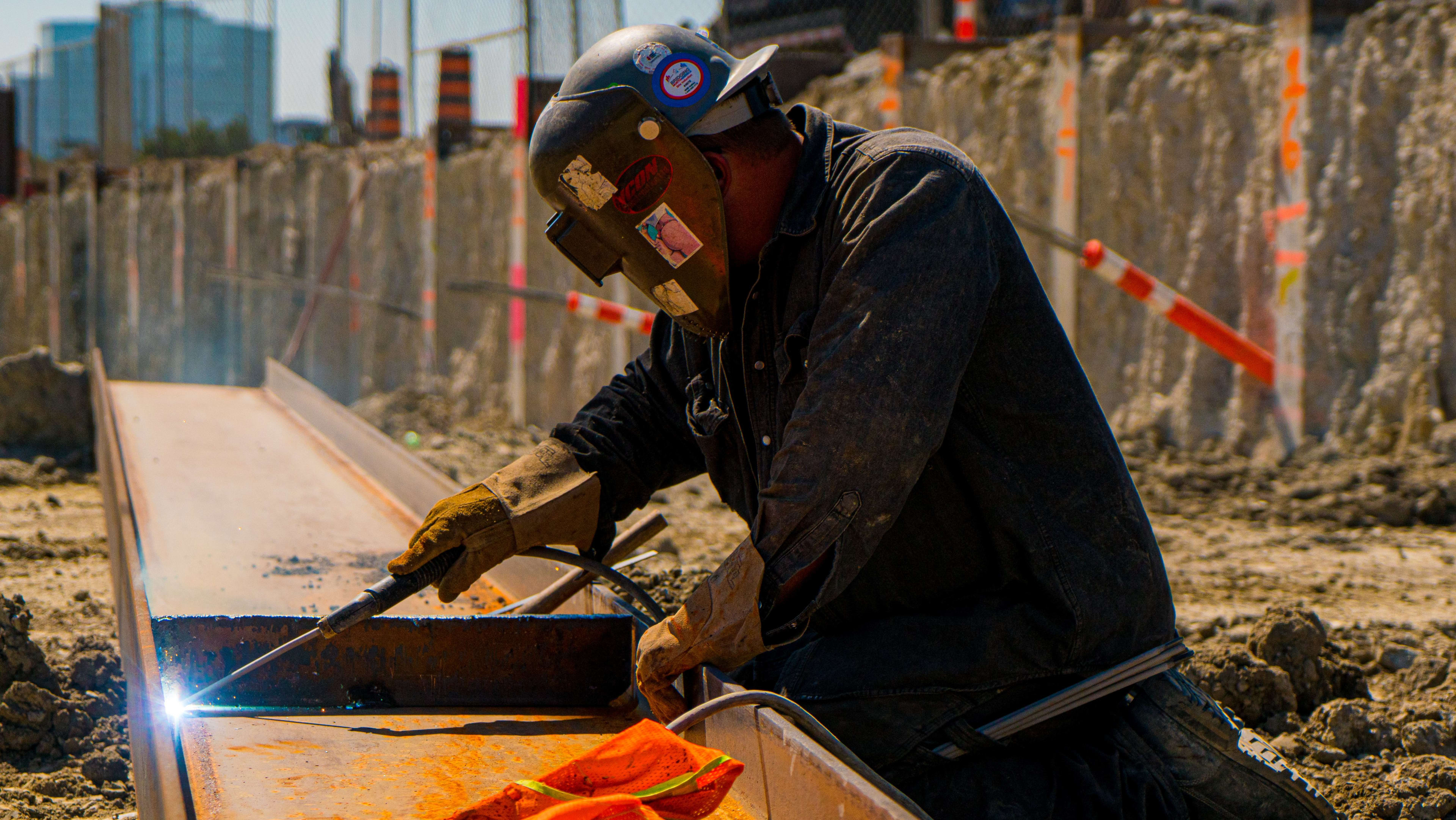 close up of person welding metal