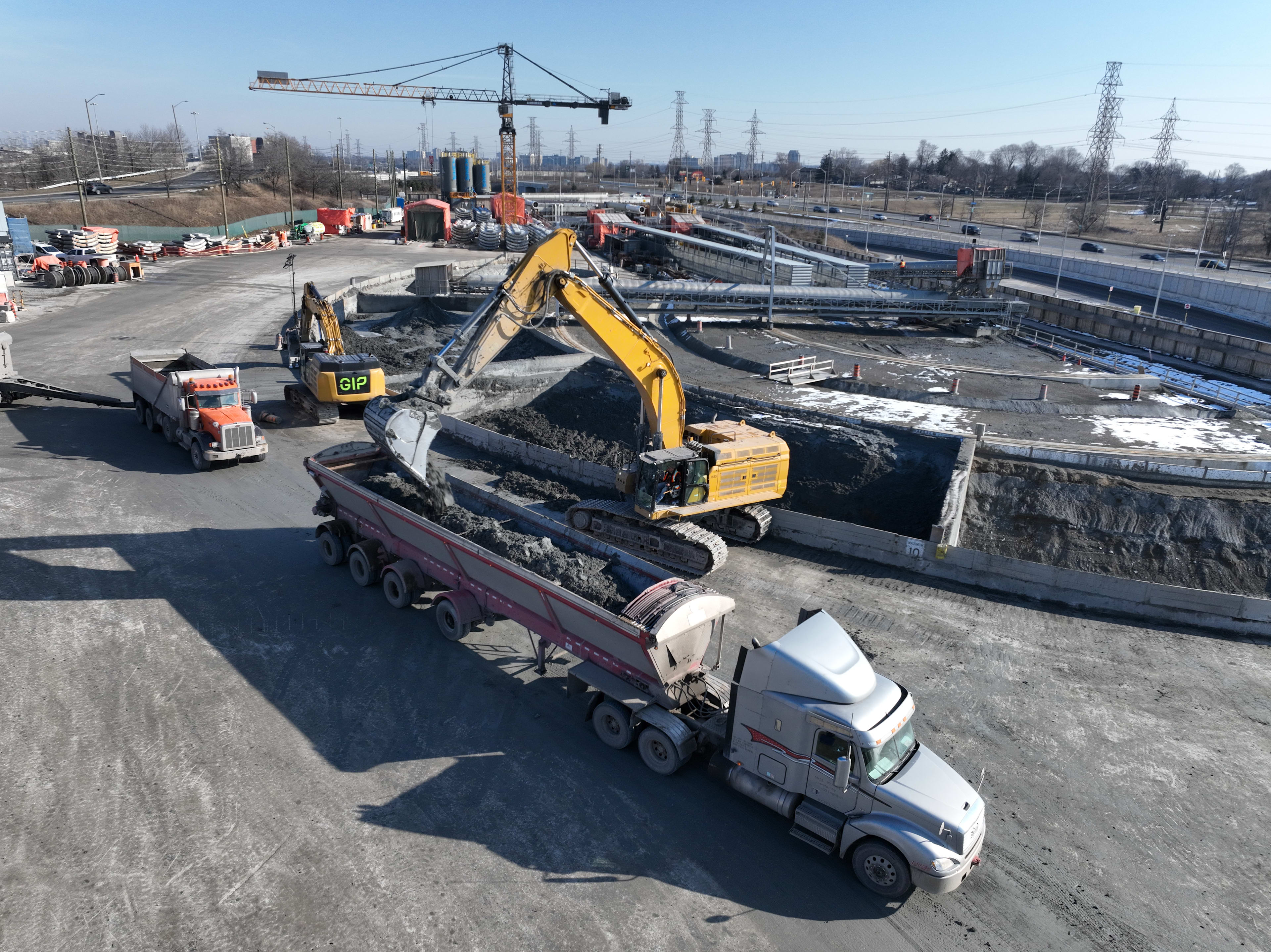 A dump truck is loaded at the Eglinton Crosstown West Extension launch shaft.