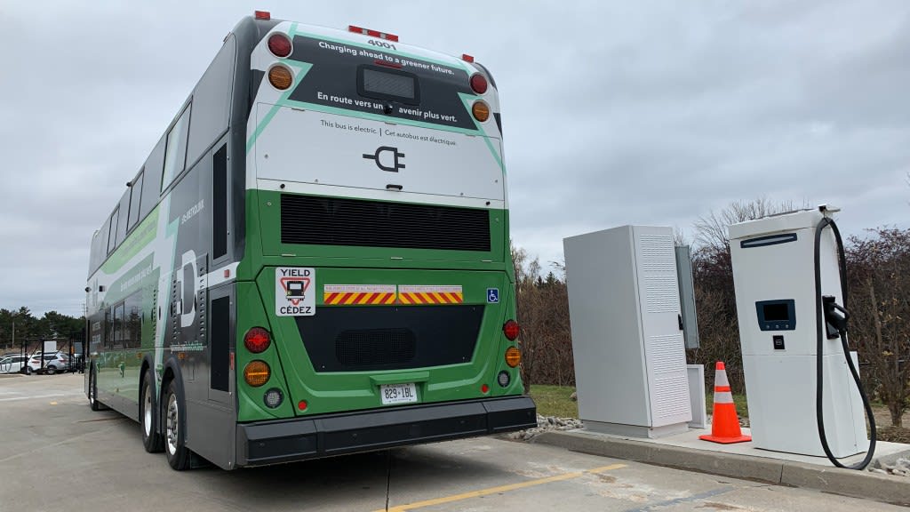 One of the EV GO buses at the charging station, getting ready to 'fill up