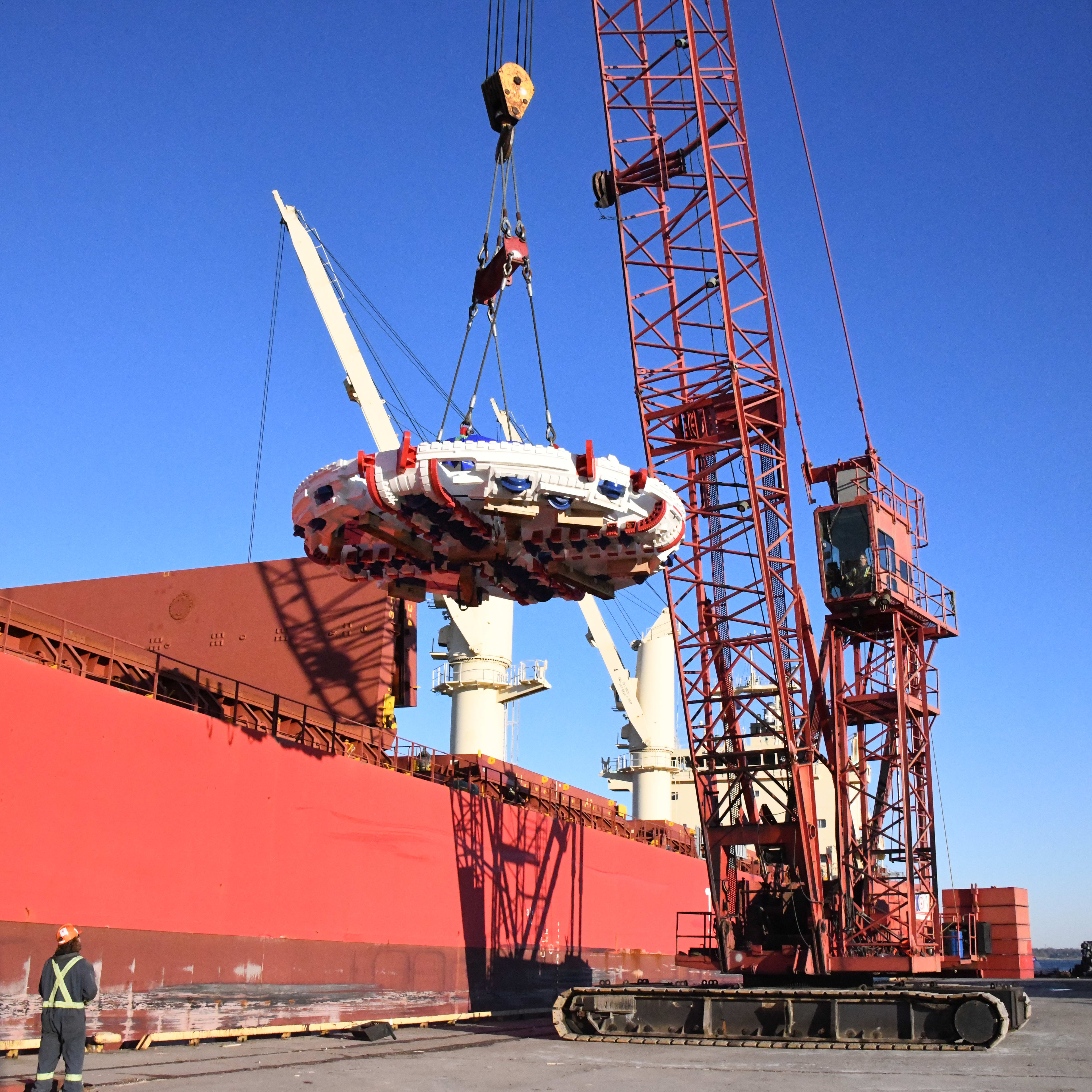 crews offloading the parts.