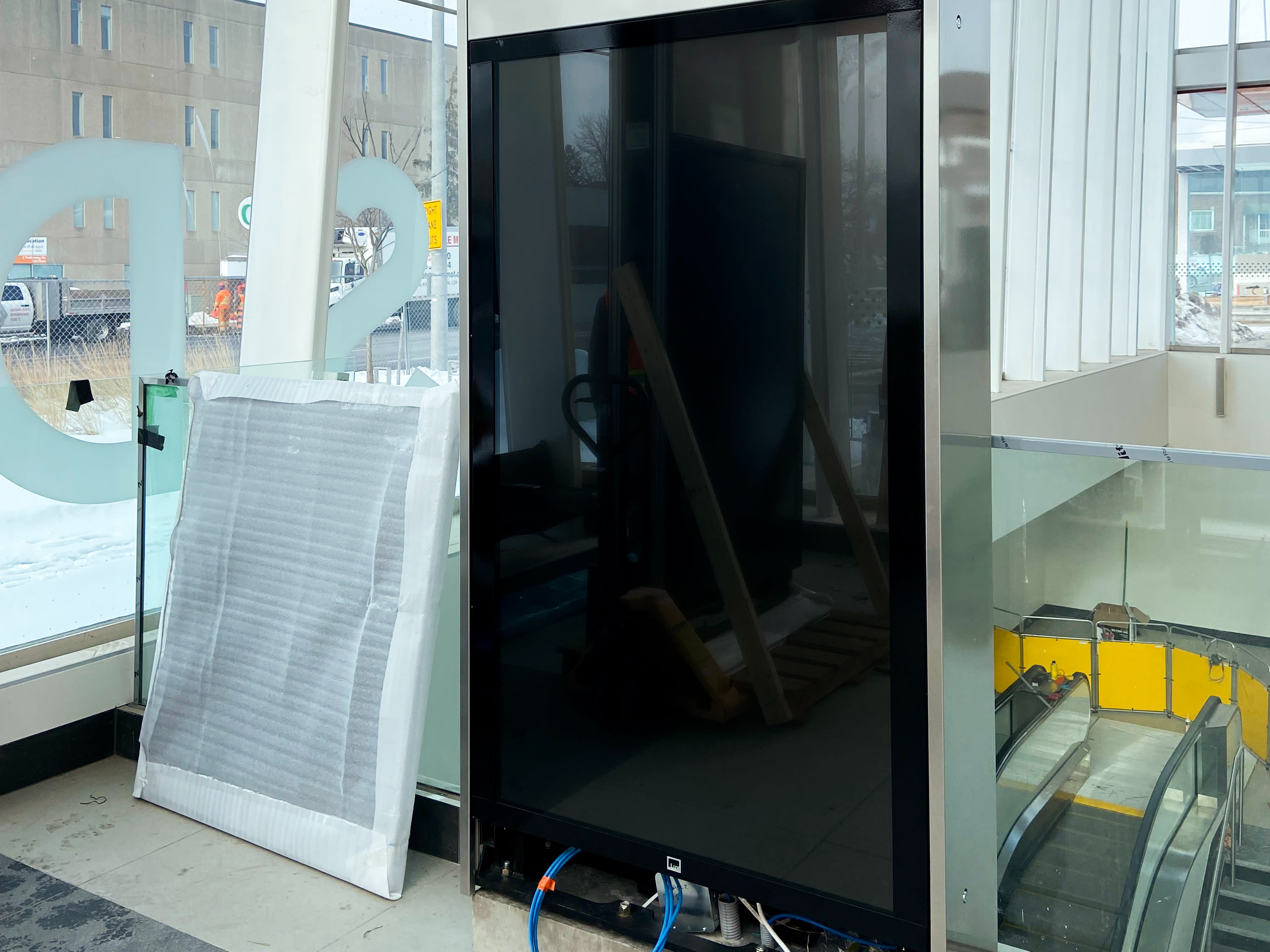 interactive kiosk being installed