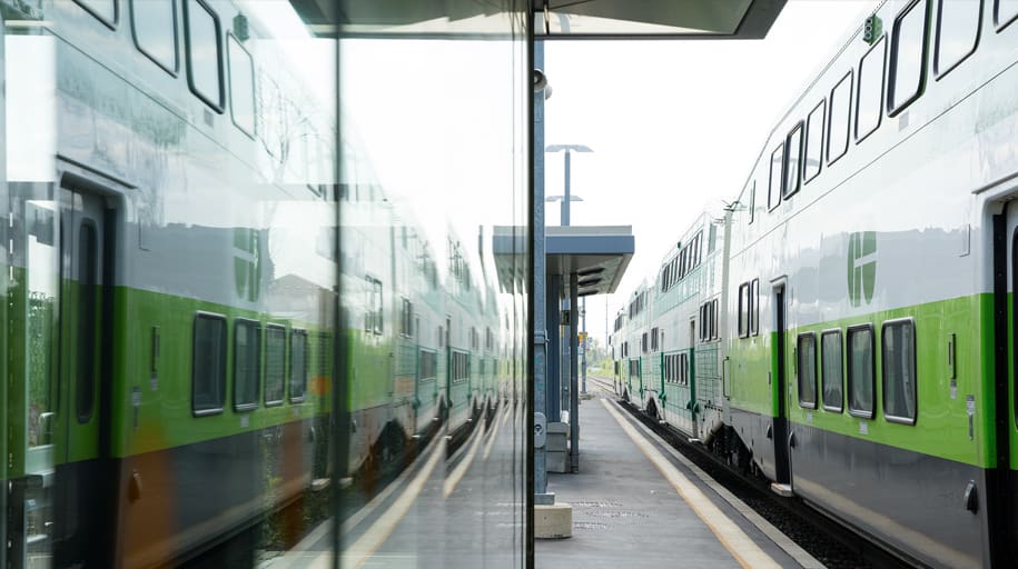 GO trains are seen on a platform.