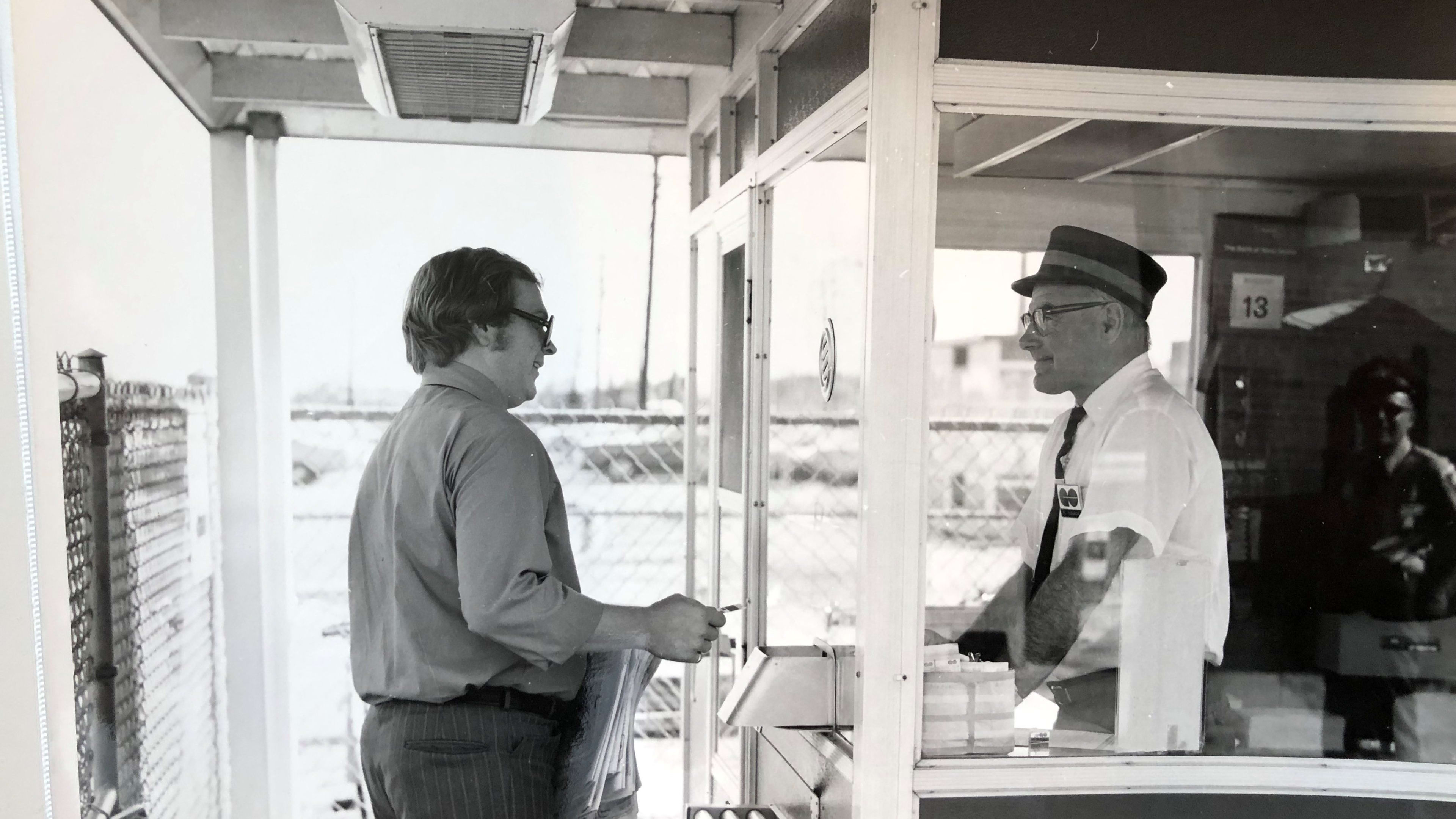 A customer buys a GO Transit ticket from an agent in this shot from 1971.