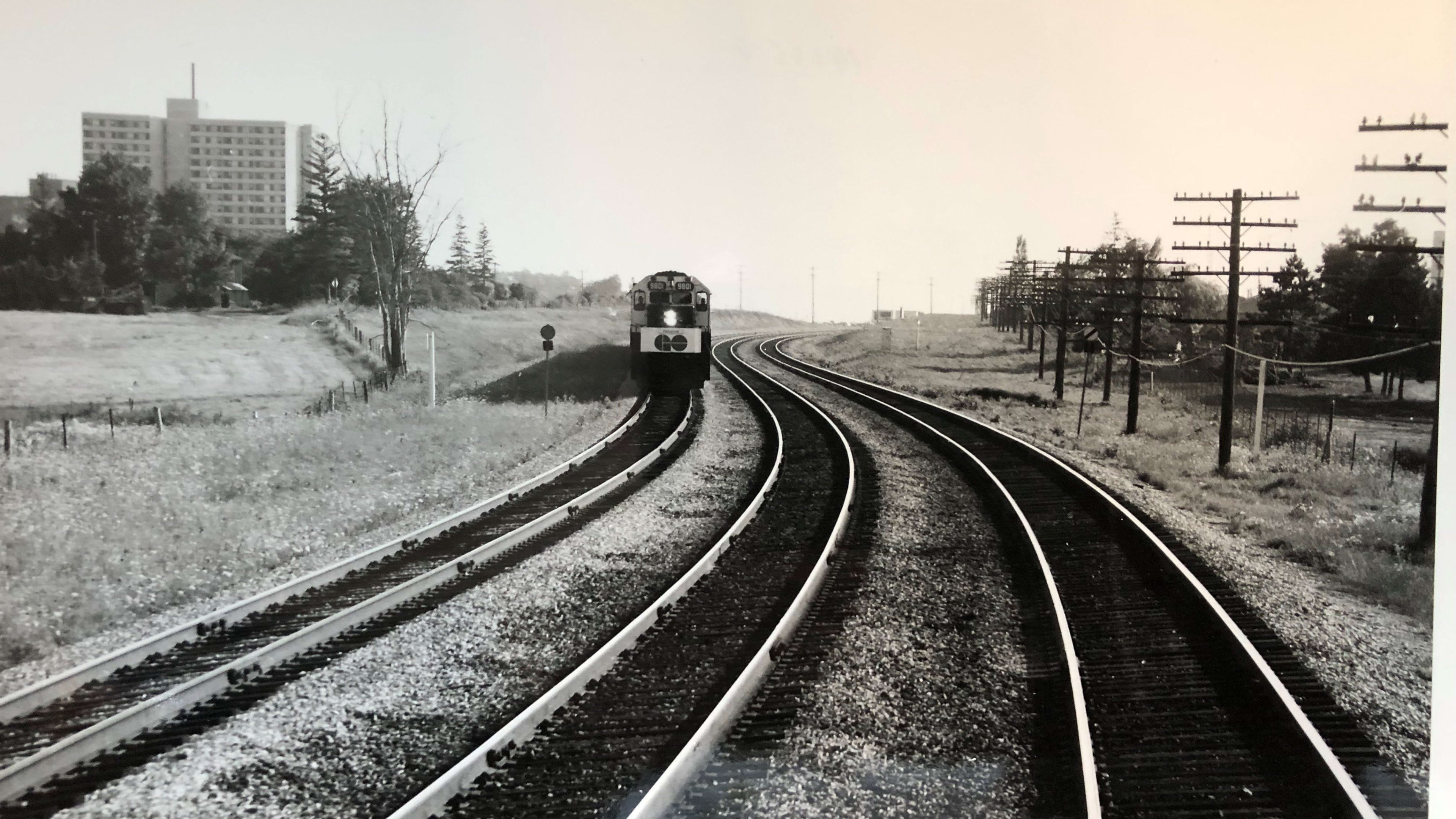 A GO train moves down the tracks.