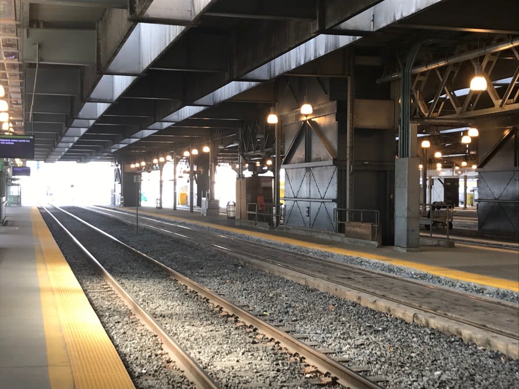 an elevator across from tracks.