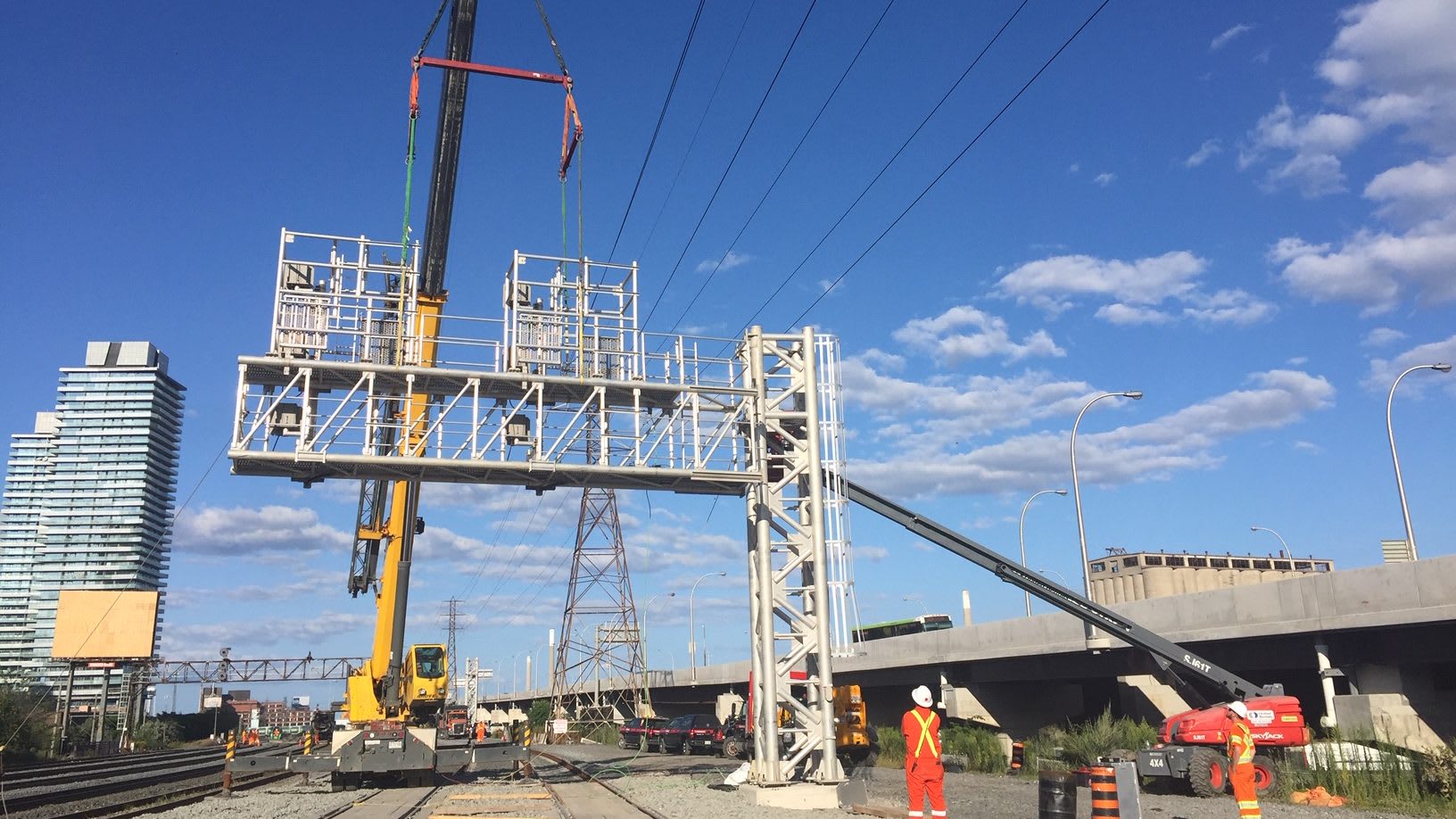 Crews work to install a signal bridge on the east side of Union Station earlier this year.