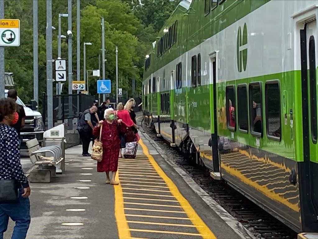 Riders step aboard a Niagara GO train on the first weekend.