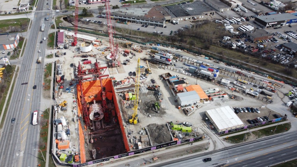 Birdâ??s eye view of the launch shaft site with the main drive of the TBM lowered into the launc...