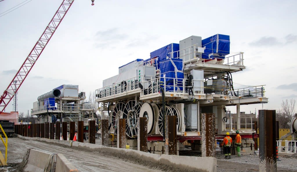 The TBM gantry system that will be lowered and connected to the TBM. The gantry contains support ...