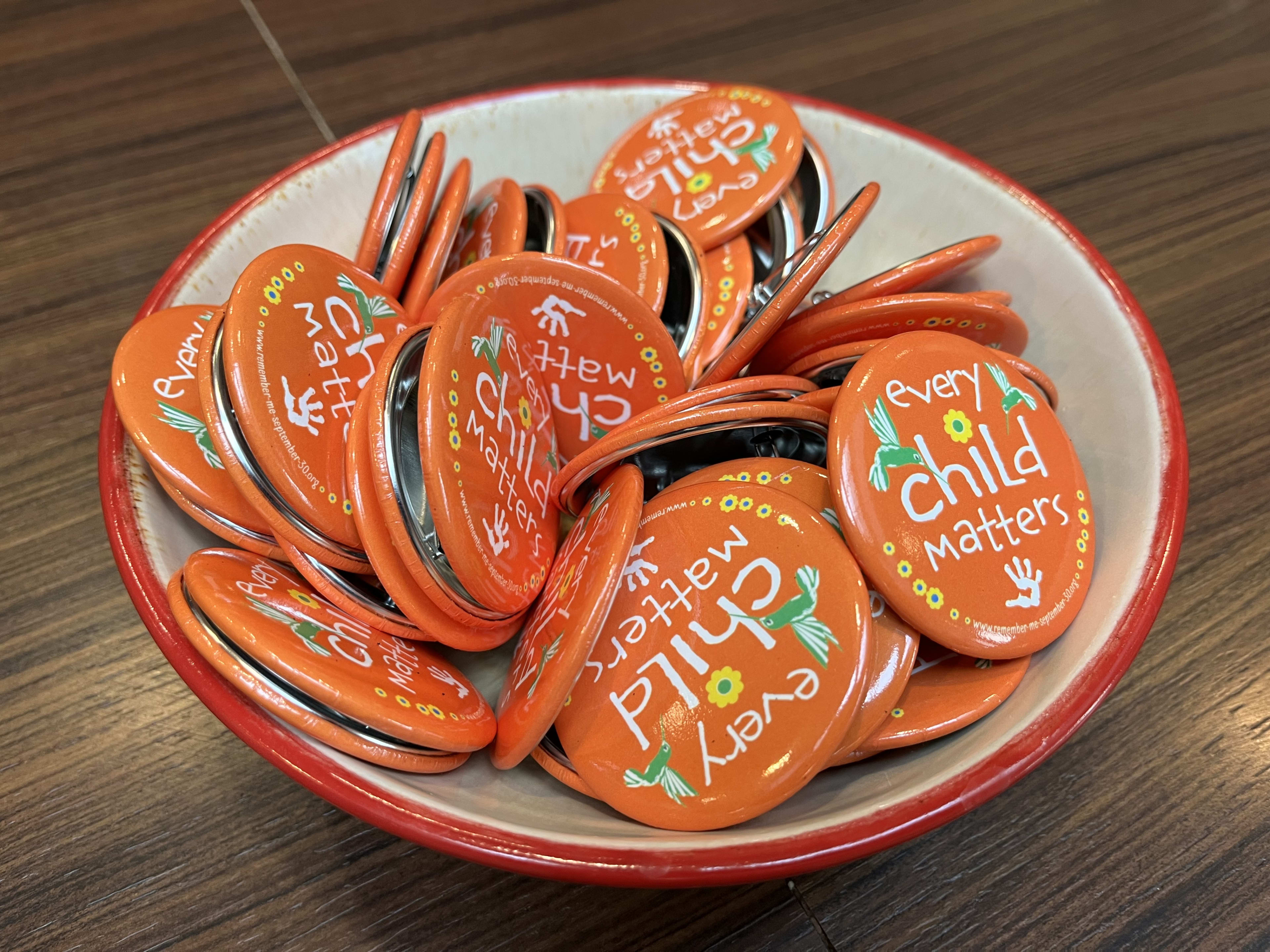 Buttons are shown that say "every child matters."