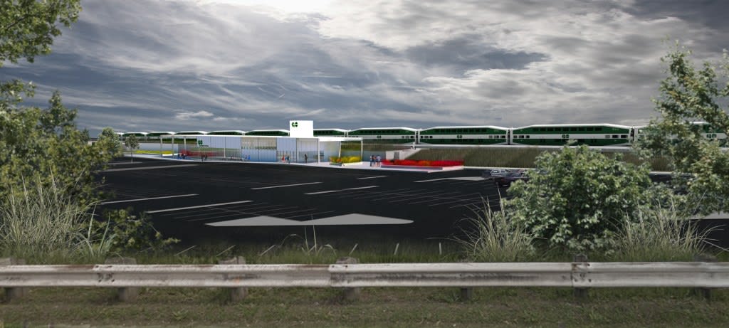 Image show a GO train pulling in.