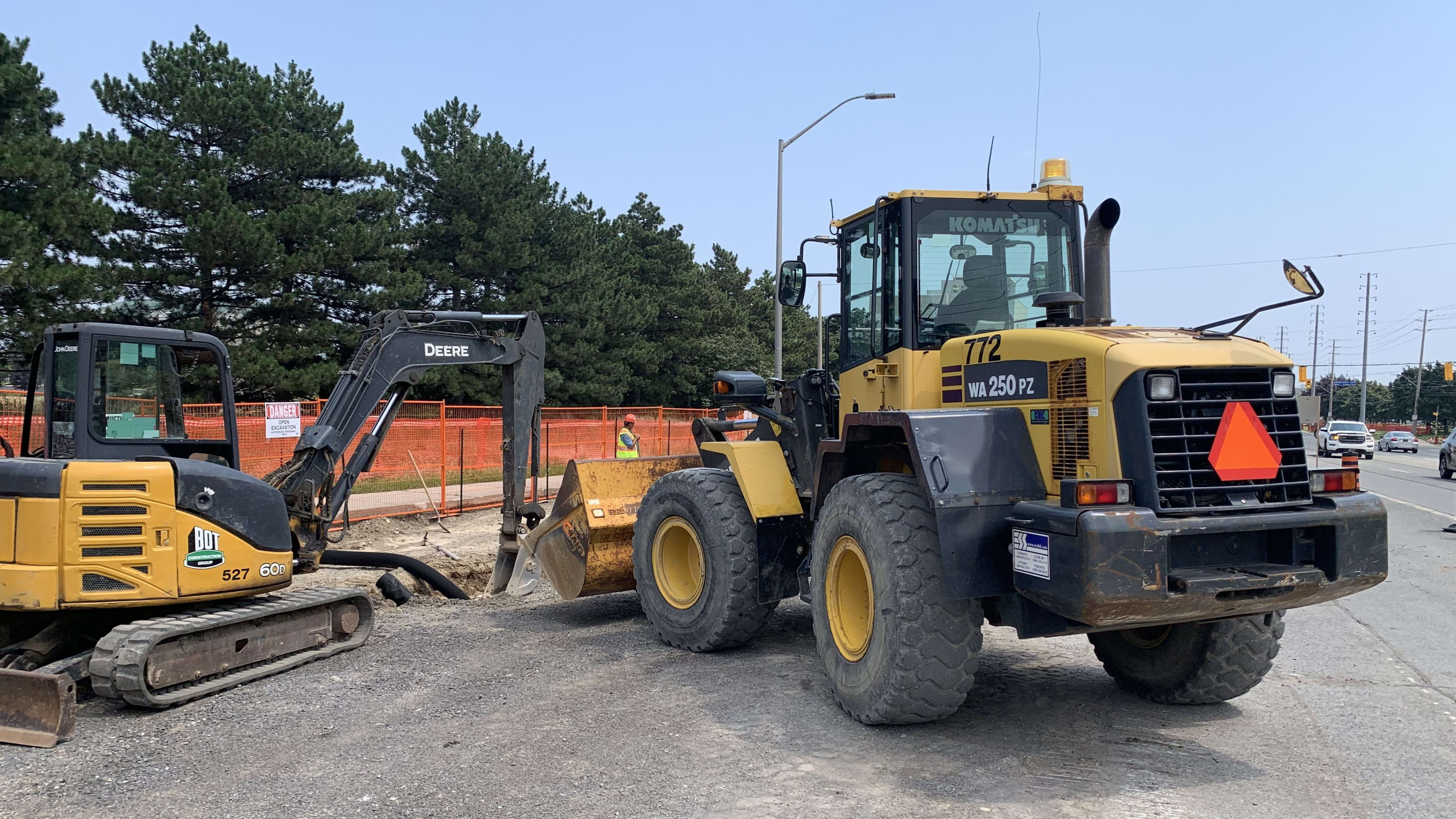 An excavator and a loader work on widening Hurontario Street between Matheson Boulevard and Trade...