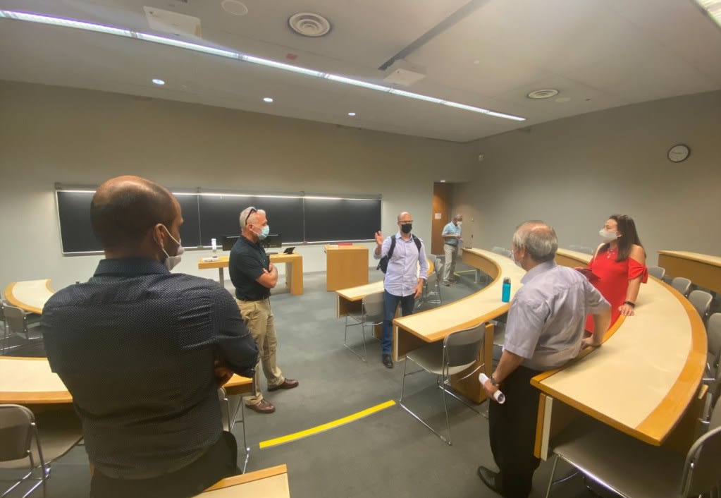 people talking inside a room.