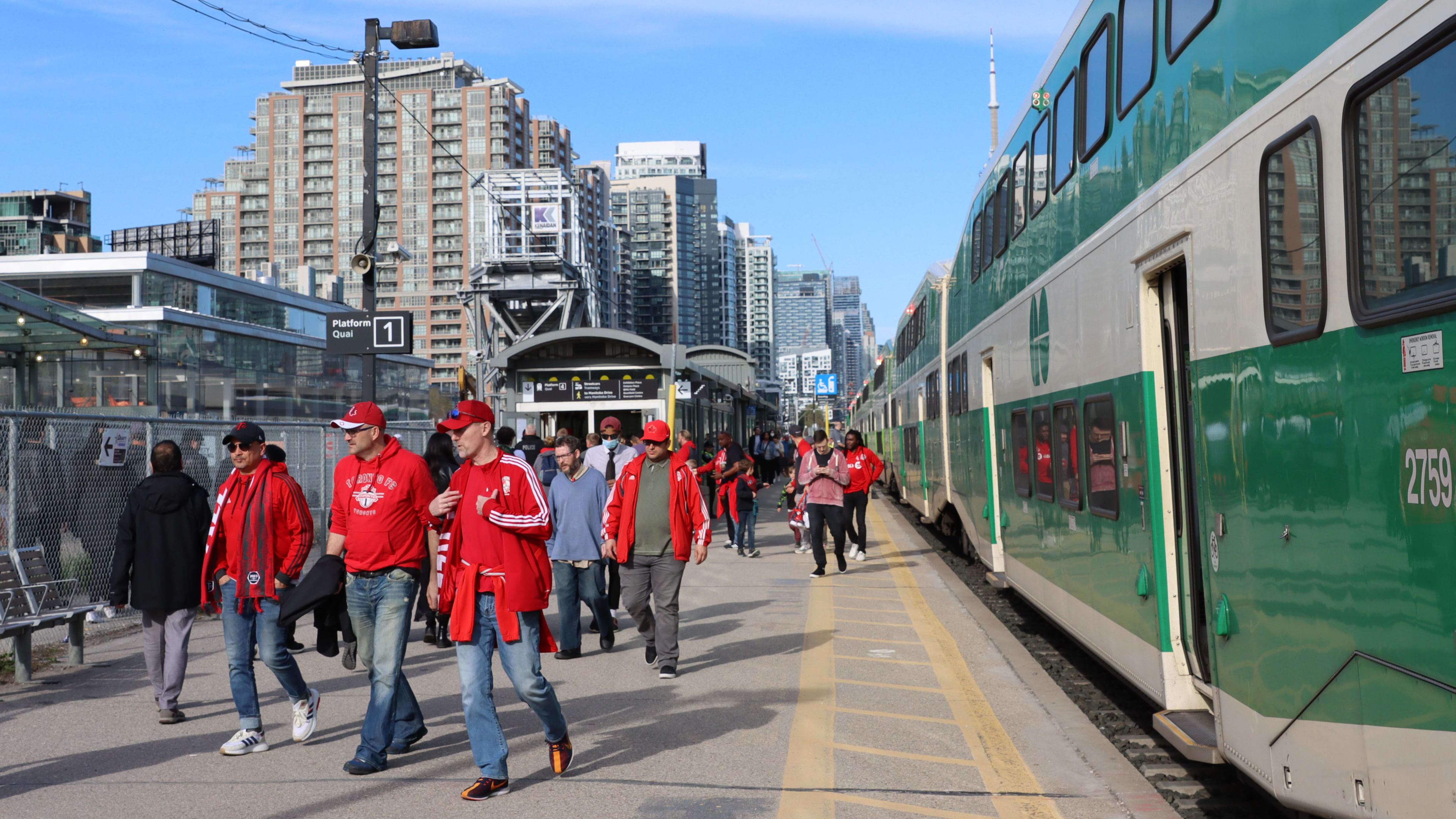 TFC fans disembark from train and head towards Liberty Village