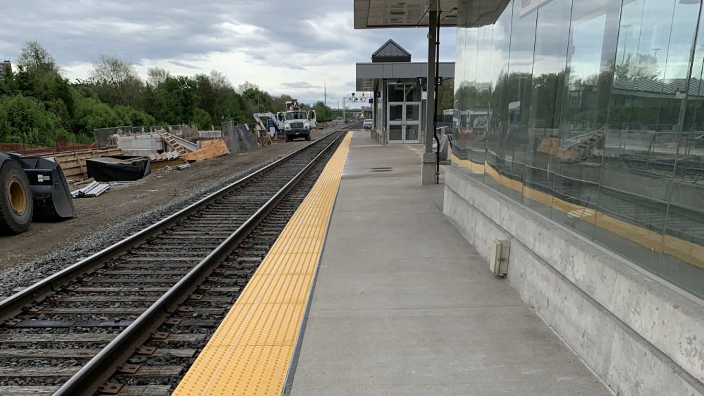 Recently installed yellow tactile edges on the train platform at Weston GO Station