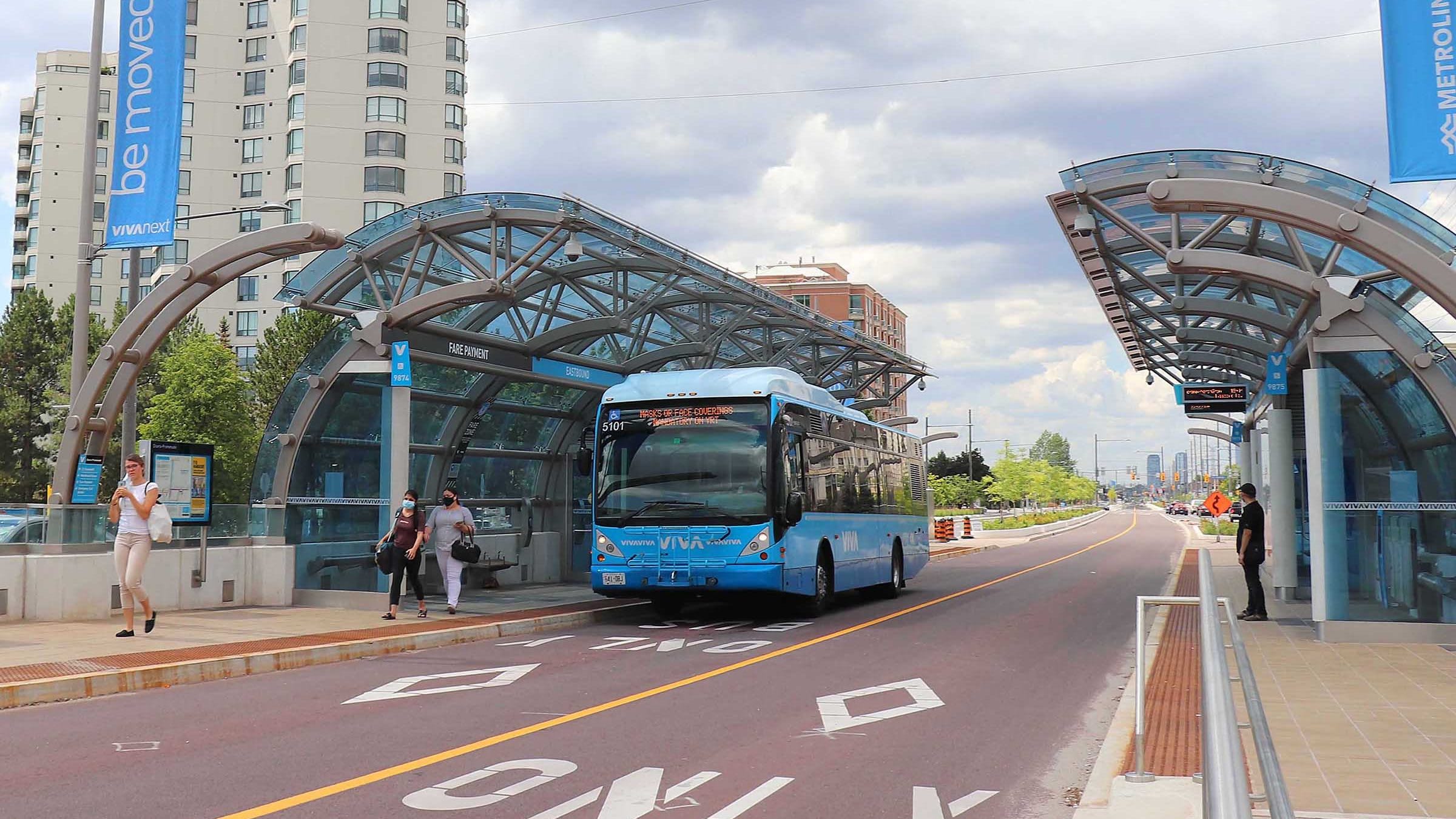 A bus stops at a platform.