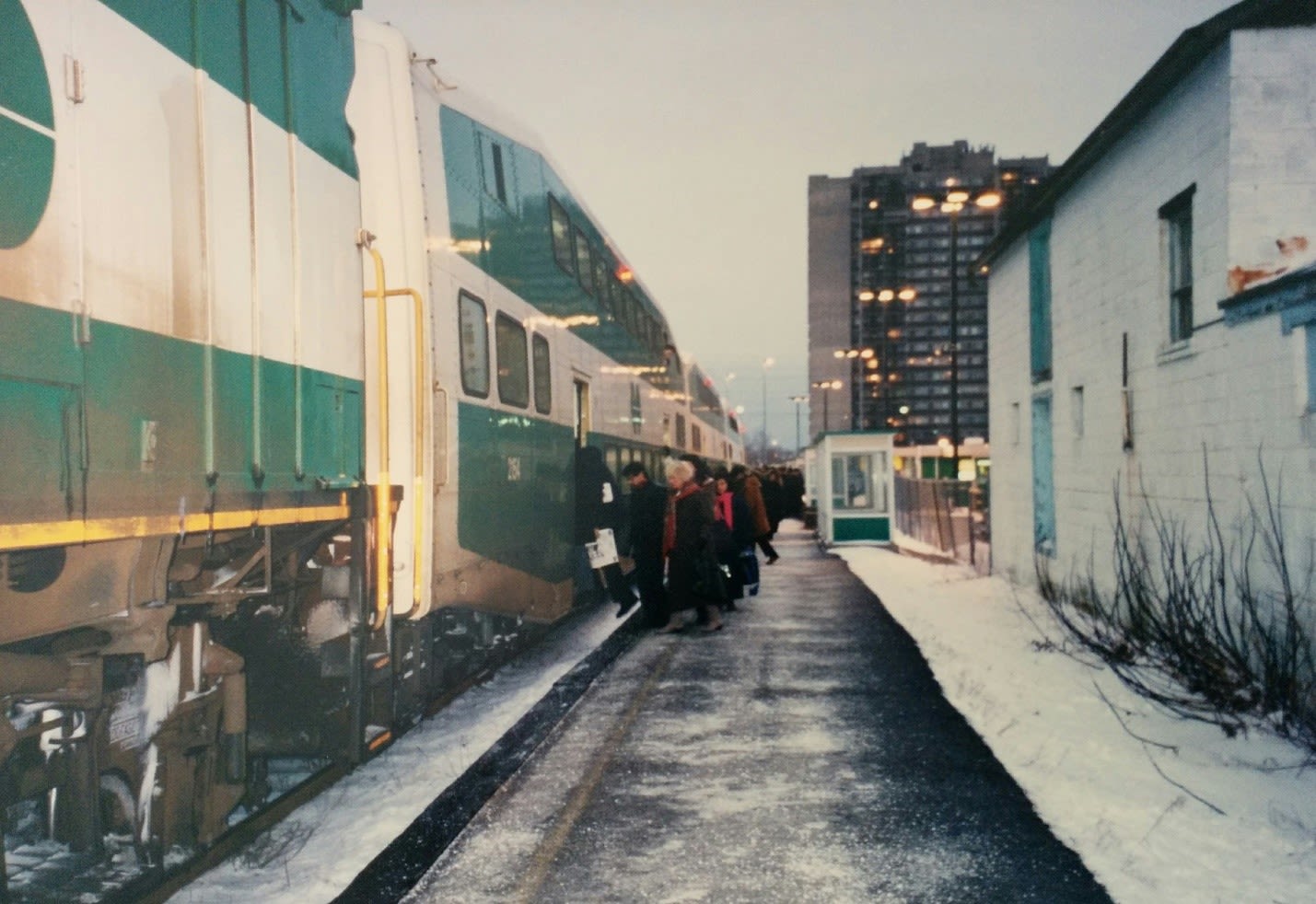 Commuters getting on a GO Train in the 1980s during the winter