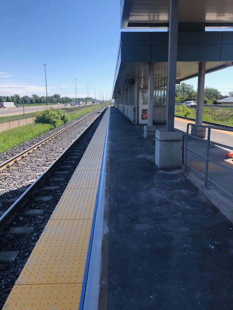 tactile yellow strips on the platform.