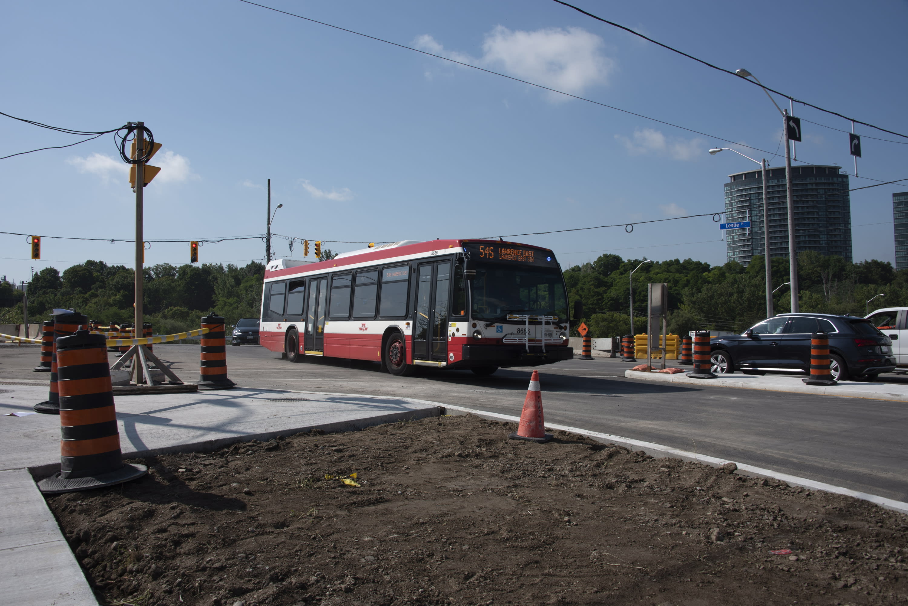 A TTC bus travels through the Leslie Street intersection.