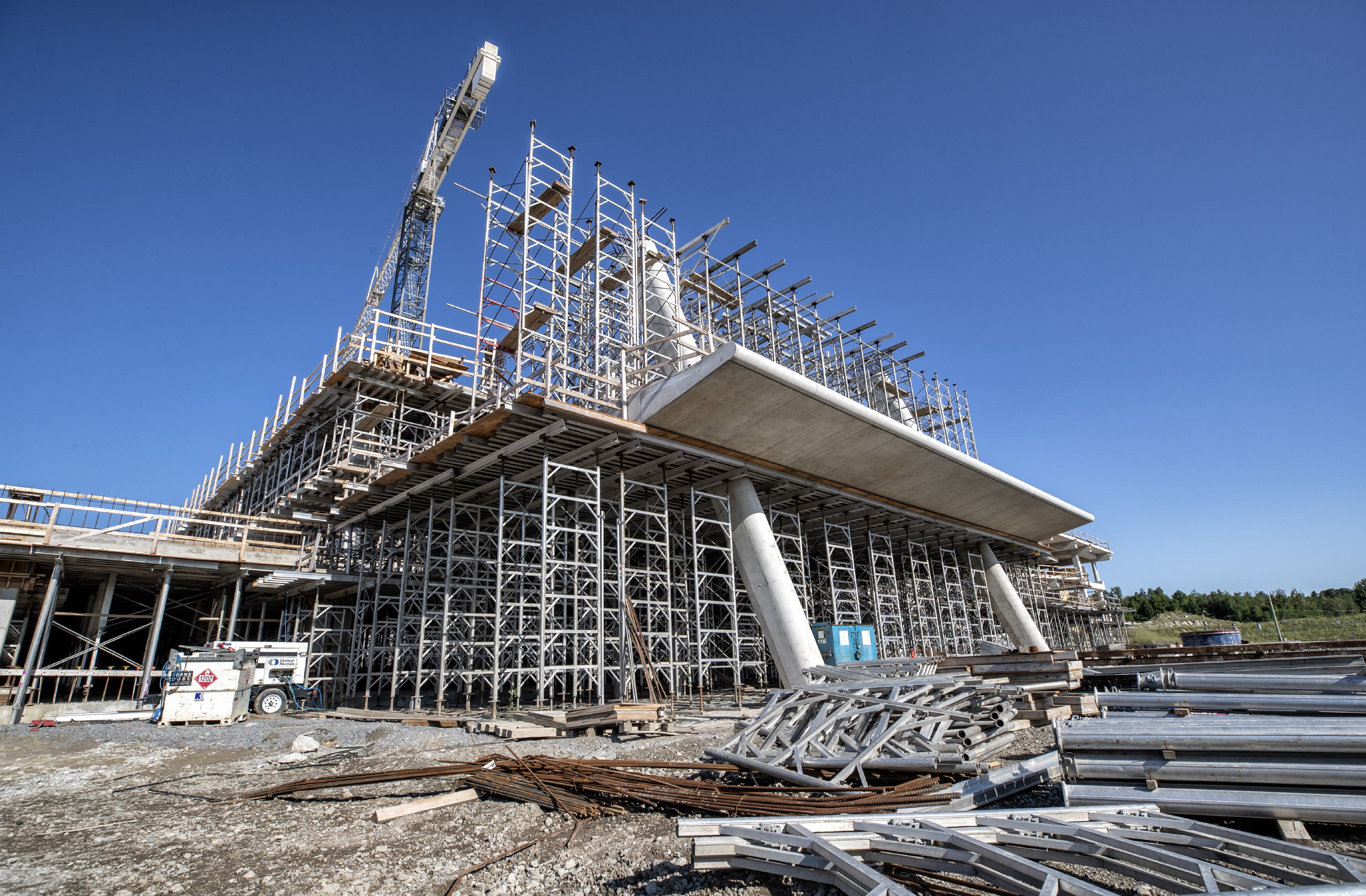 Concrete and metal supports are shown for the new station.