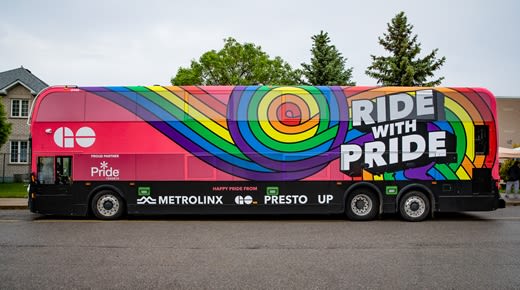 the Ride with Pride special edition GO bus with rainbow decals