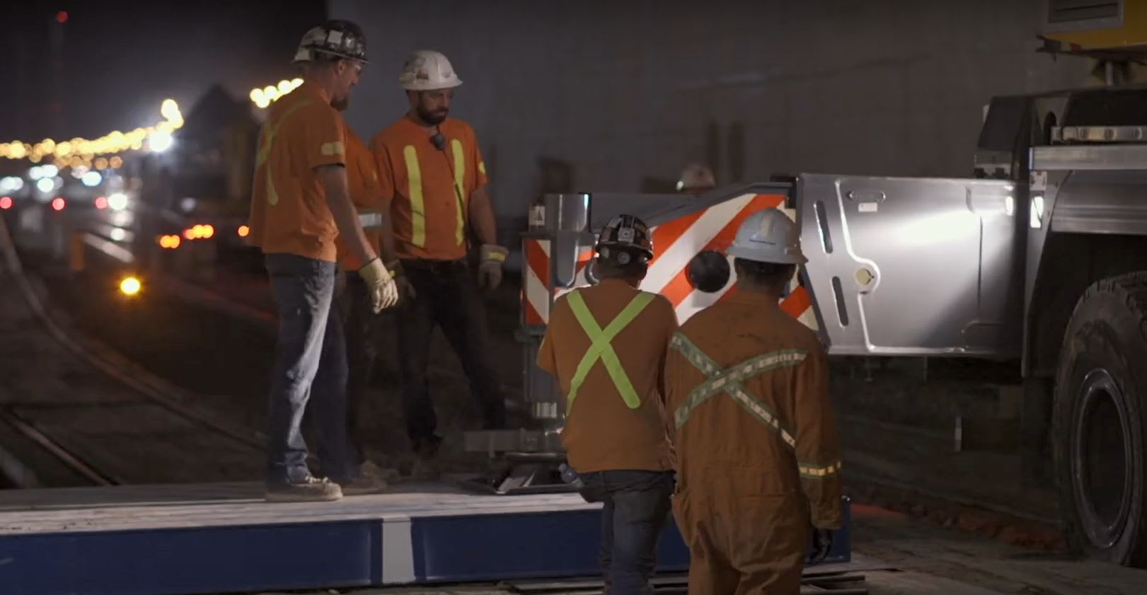 An image of crews working on the bridge.