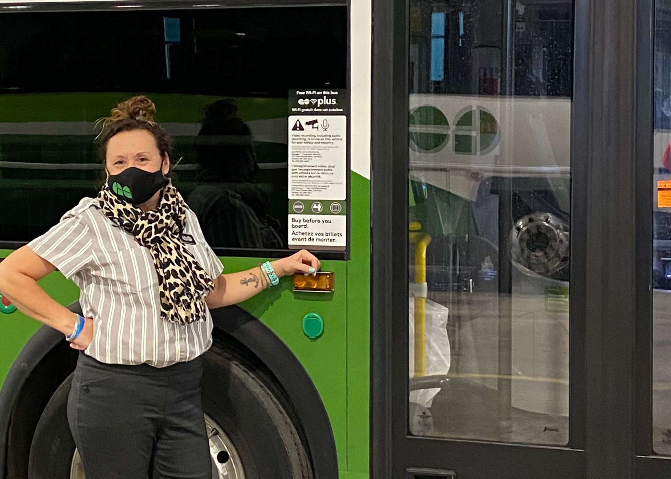 her standing by her bus.