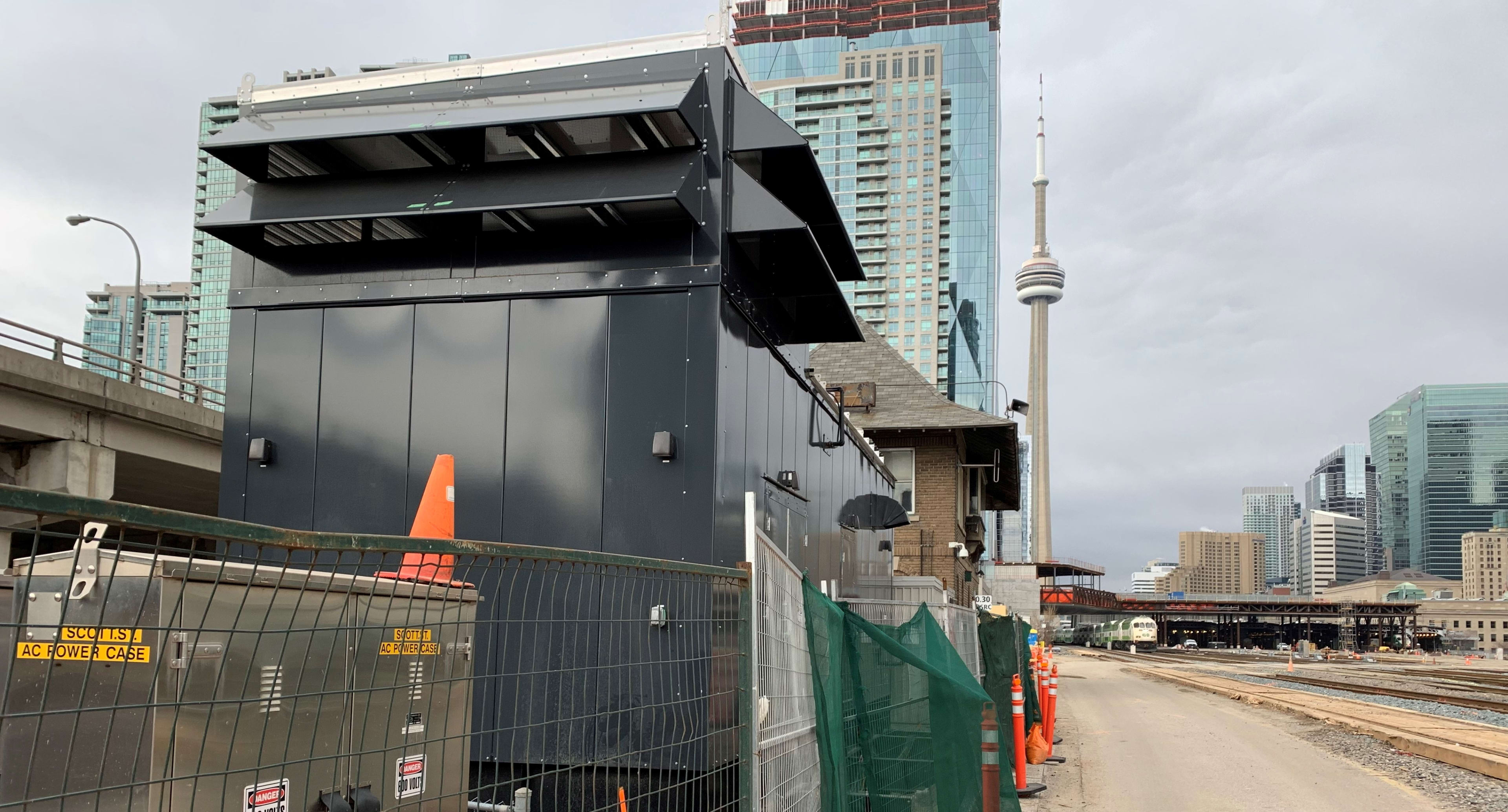 a large green generator box.