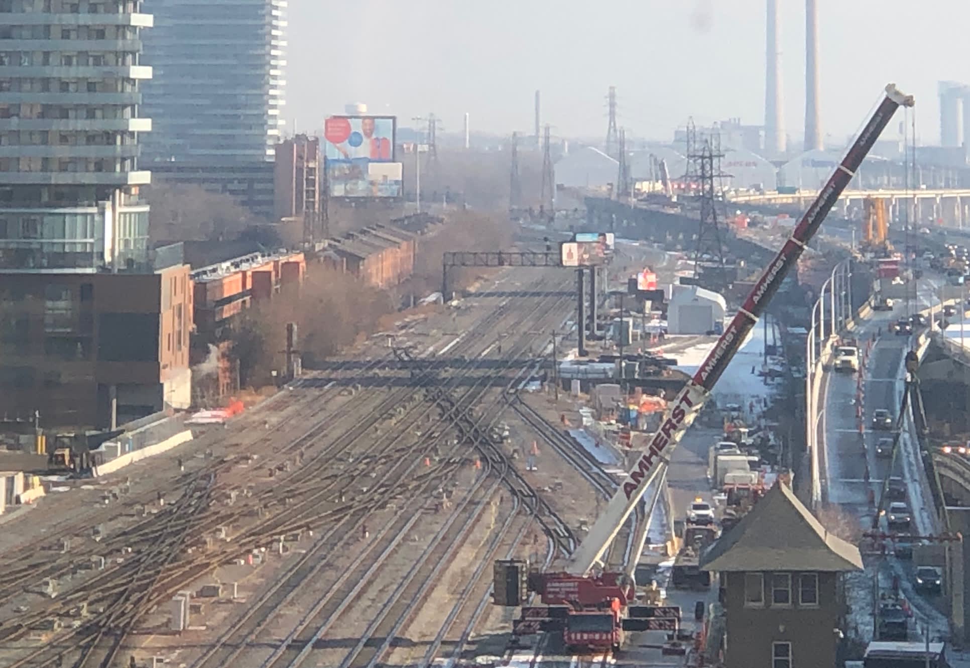 the crane beside the rail tracks.