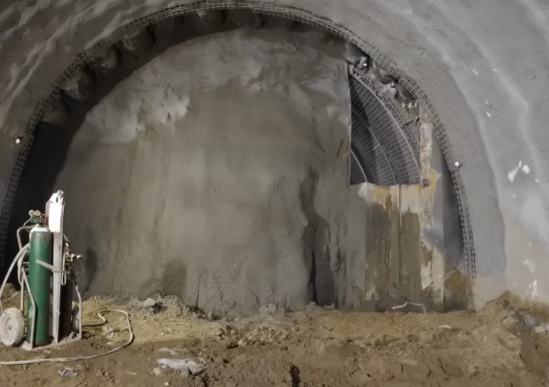 a tunnel with concrete in the middle.