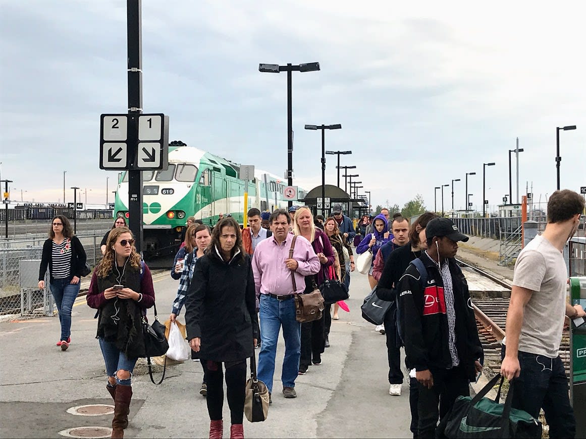 Customers gather on the platform.