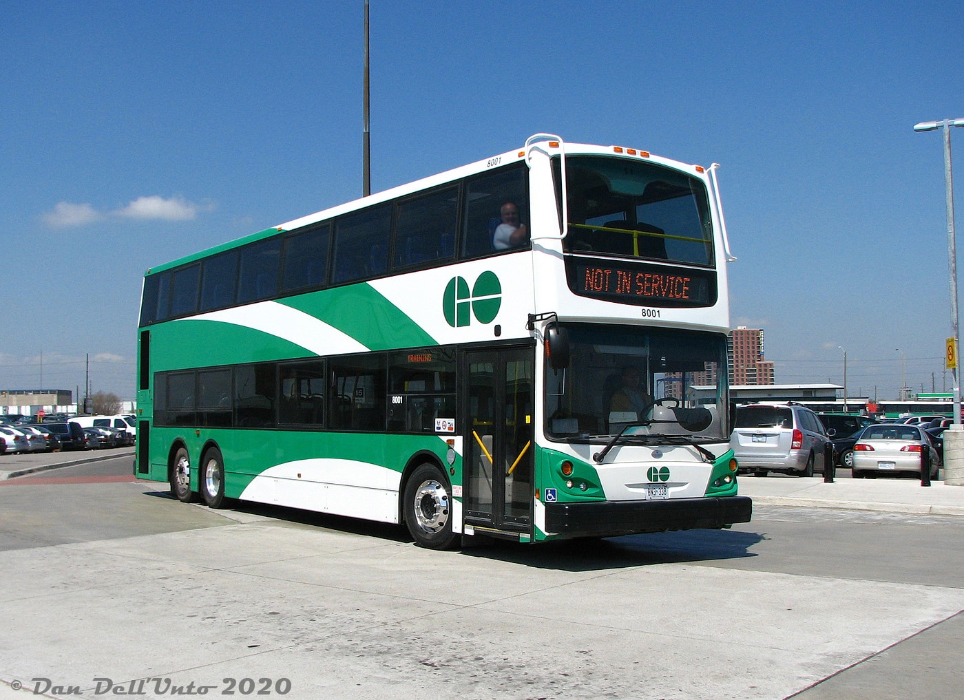 A double decker bus sits parked.