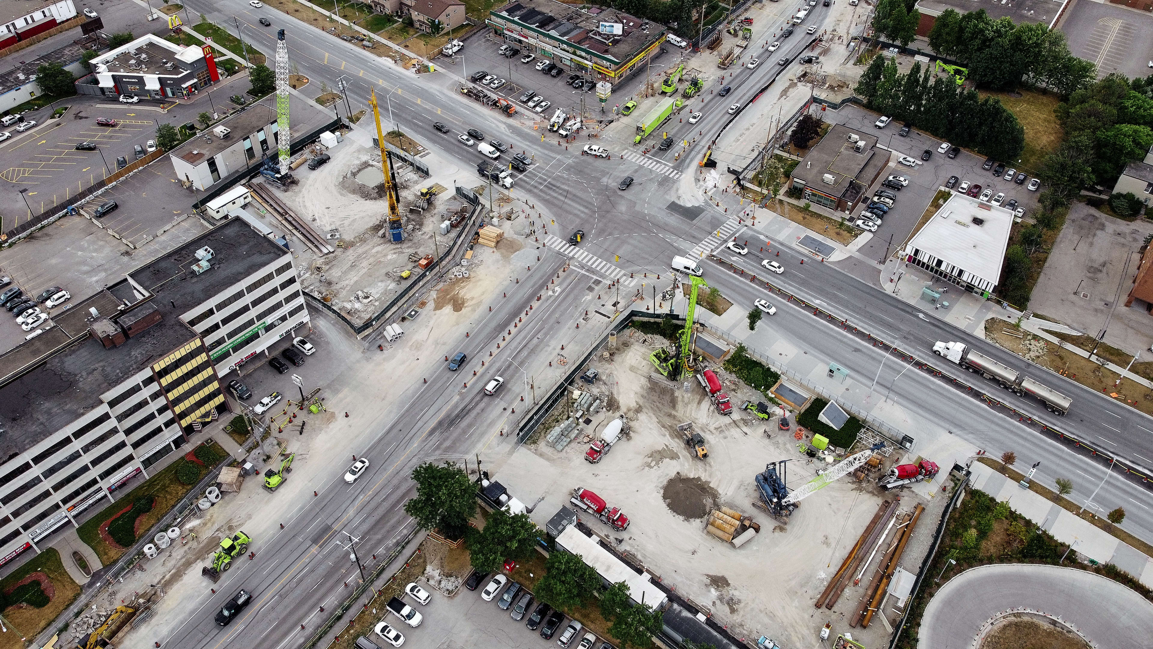 Image looks down on the site from high above. Shows streets and traffic site.