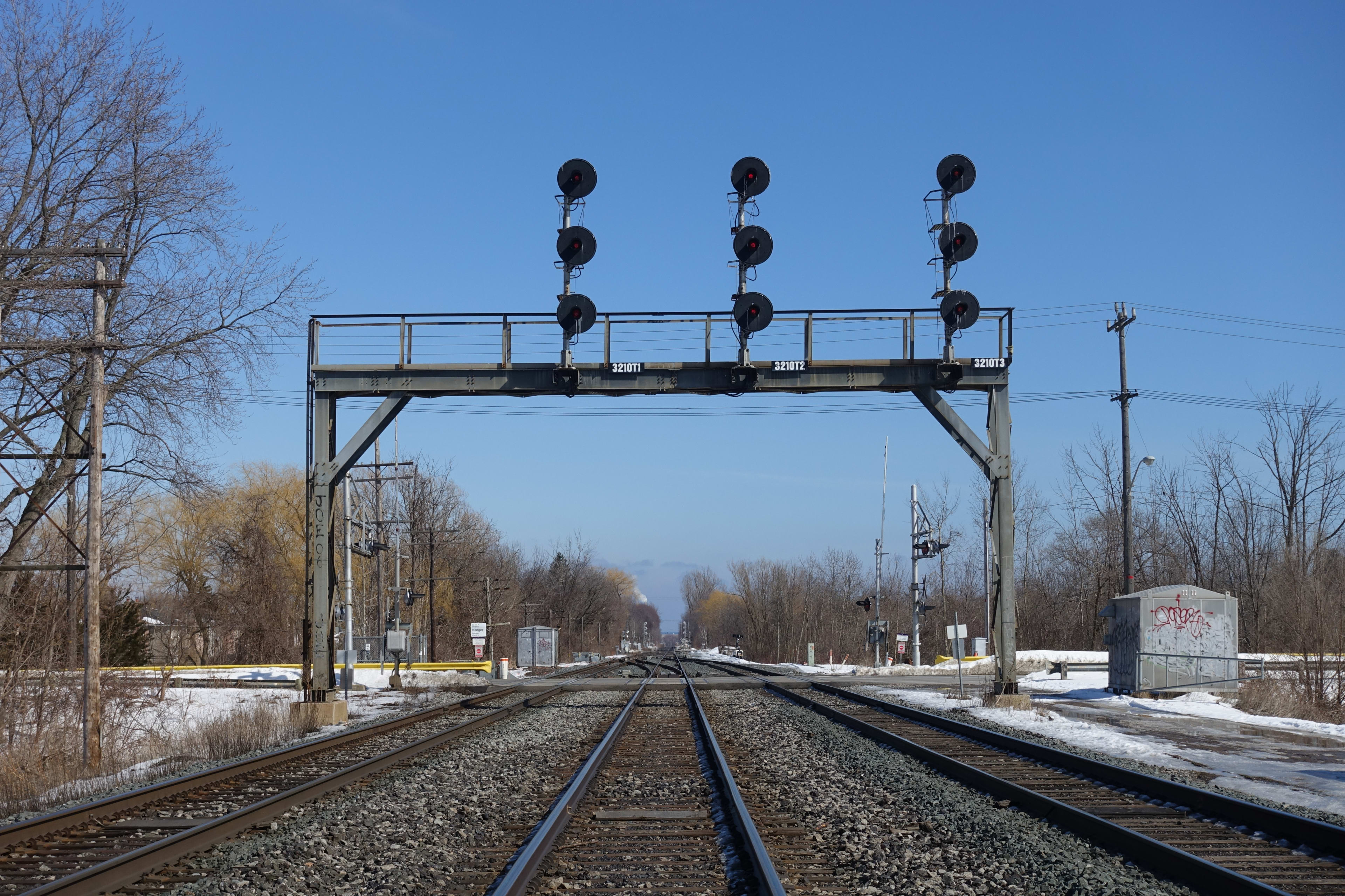 A the Lakeshore East GO line at track level looking into the distance.