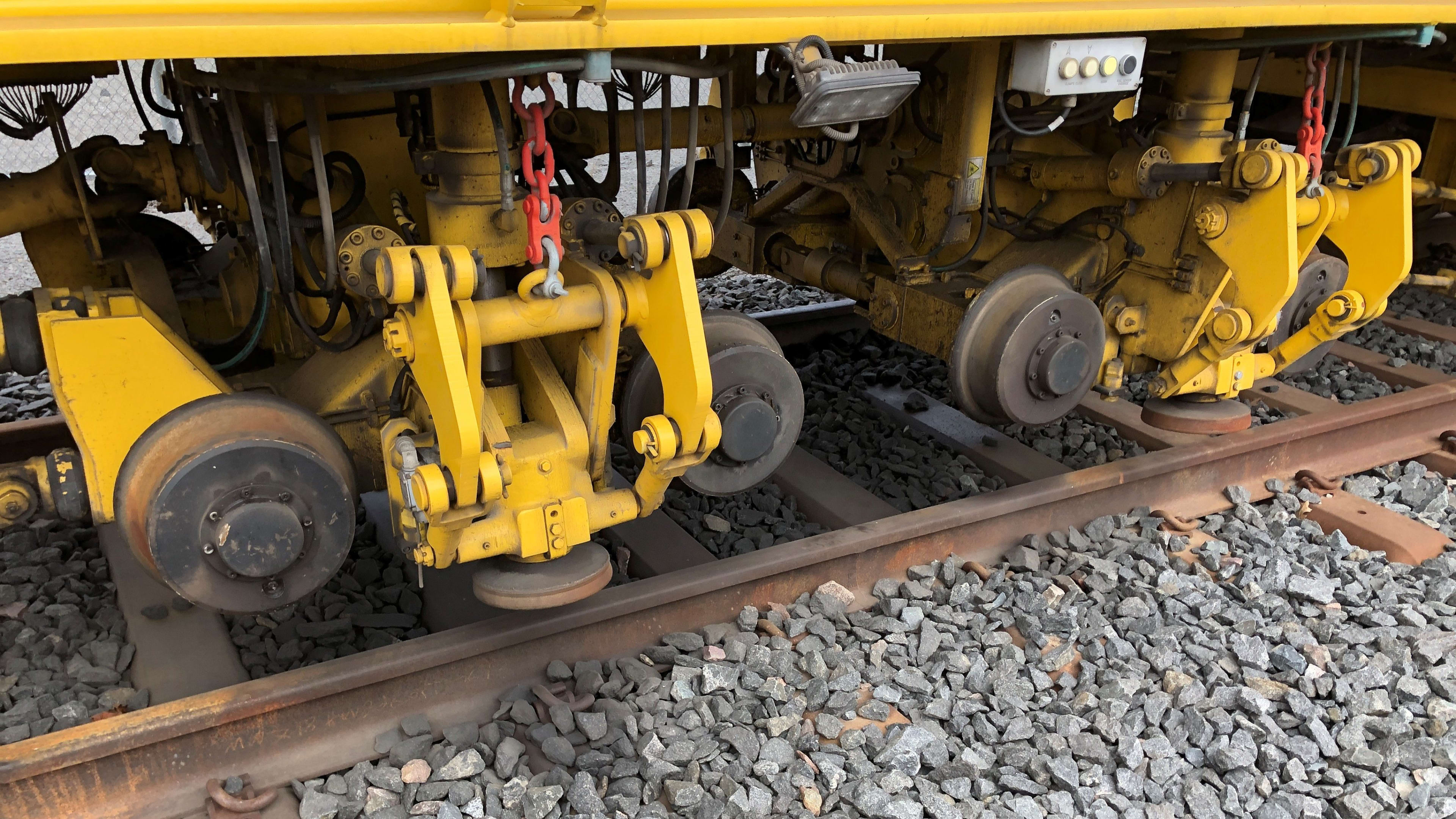 Close up shot of the stabilizer wheels that simulate the locomotive's weight